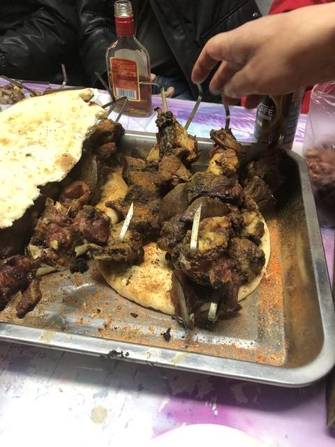 新疆羊的做法_新疆美食烤全羊_新疆羊肉美食